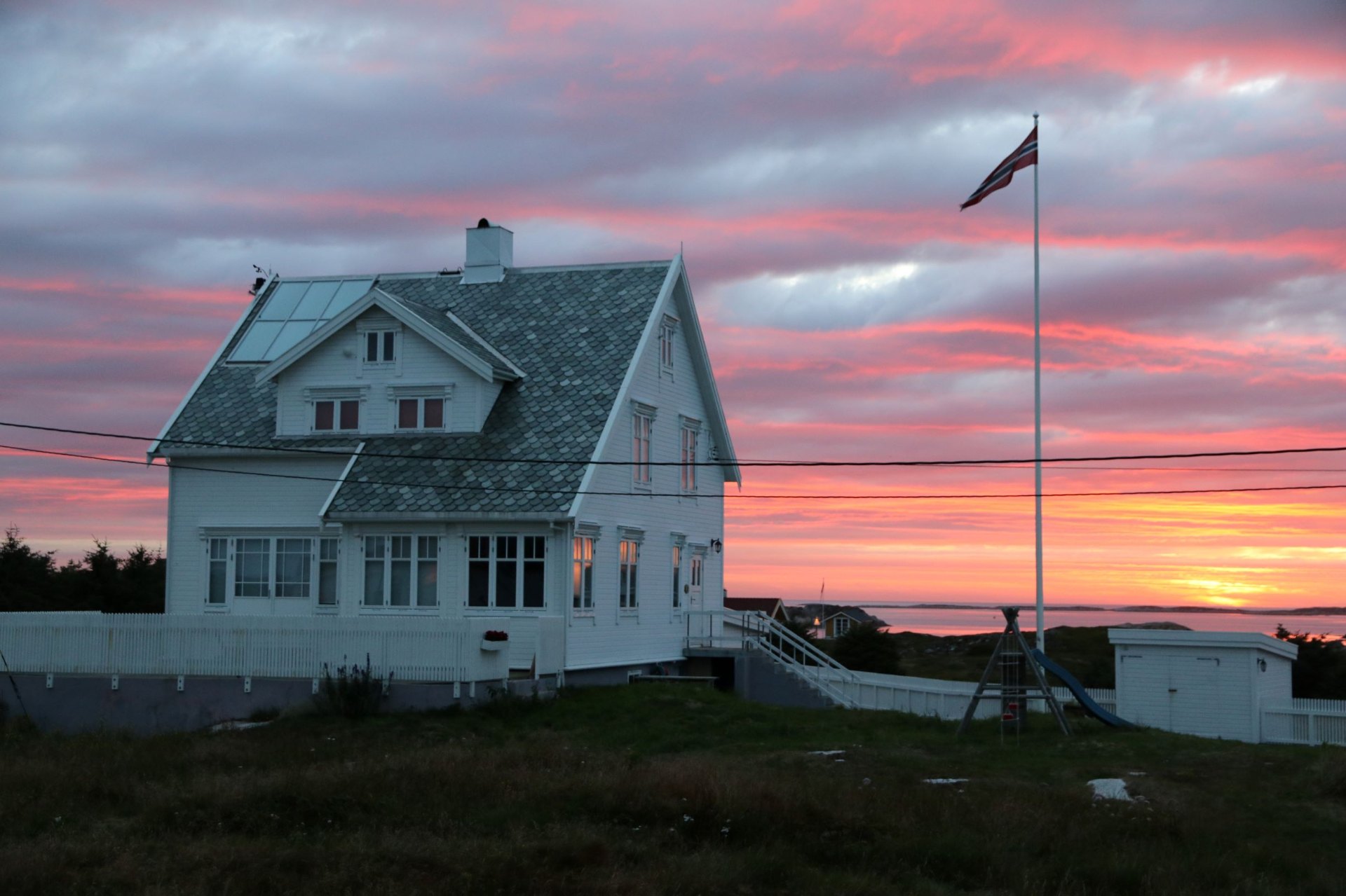 Øvergården exterior at sunset